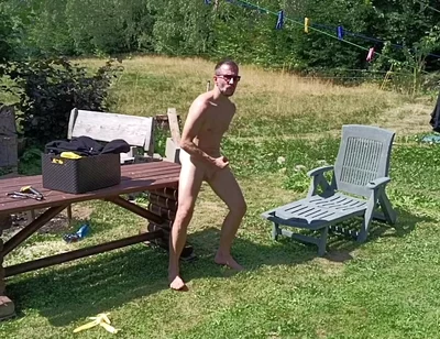 Jerking off While Hanging Out the Laundry