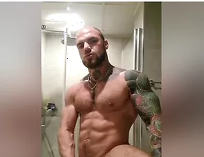 Bold Tattooed Jock Flexing In Bathroom And Jerking Massive Cock