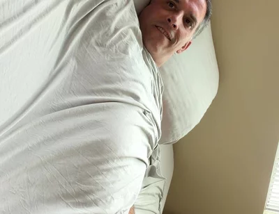 Duke Silver Plays the Trombone in Bed