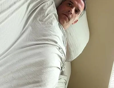 Duke Silver Plays the Trombone in Bed