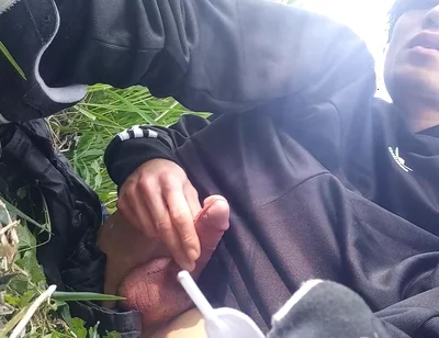 Gay boy Jon Arteen, wearing adidas tracksuit Campus sneakers, gets a hard-on outdoors