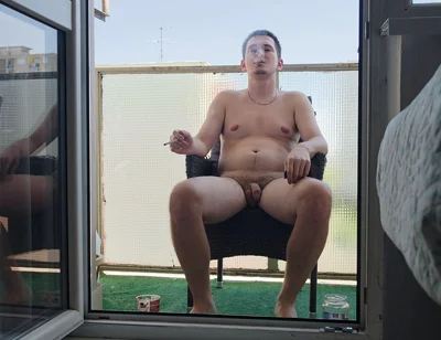 Exhibitionist Enjoys His Cigarette and Coffee Naked on the Balcony