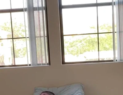Watching Him Drift Between Shirts and Shorts