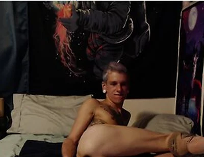 Smooth Tattooed Twink Plays With Dildo