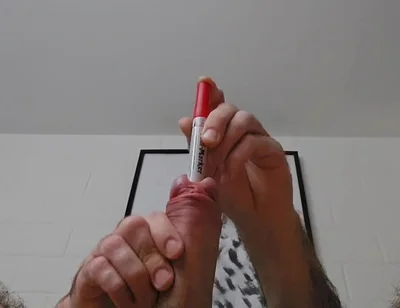 Sounding an Eding Pen While Stretching My Testicles