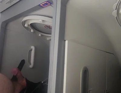Airplane Bathroom Jerk and Cum.