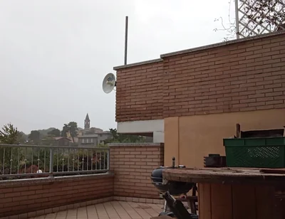 On the Terrace, in the Rain