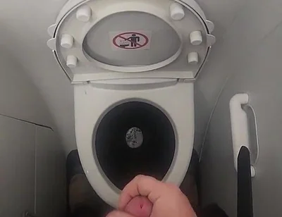 Airplane Bathroom Jerk and Cum.