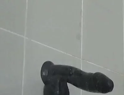 Riding a Large Black Cock Dildo 1