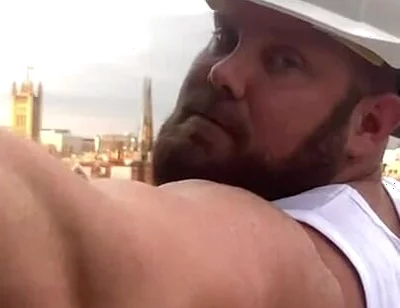 Builder Iron Bending Muscle Flexing and Measuring