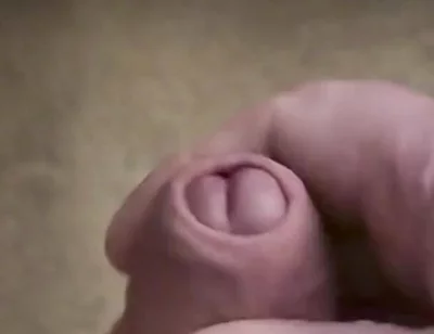 My Friend Sits in a Chair and Jerks off His Cock While Watching Video