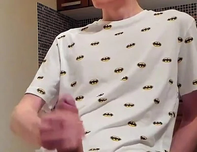 Sweet load of cum flows from this cute guy's big cock