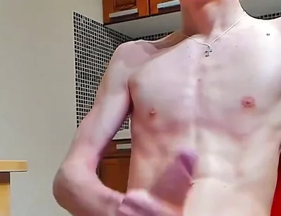 A young beautiful gay twink fucks a vibrator