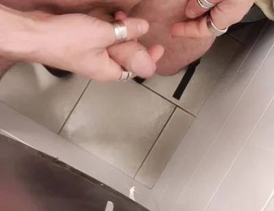 Jerking off a Cock in a Public Toilet